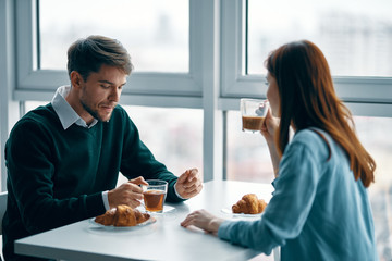 young couple having dinner in restaurant