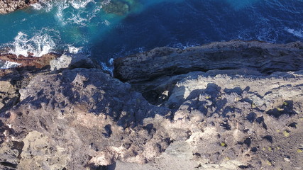Sunset between mountains cliffs and desert landscape
