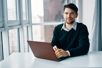 businessman working on laptop in office