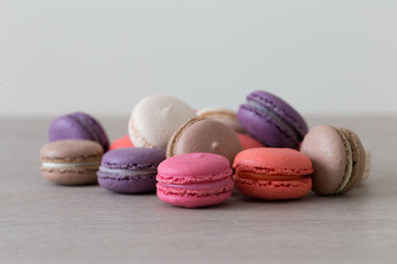 Food. macaroons сolorful, beige background