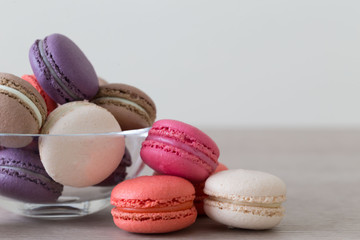 Food. macaroons сolorful, beige background