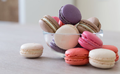 Food. macaroons сolorful, beige background