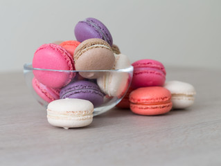 Food. macaroons сolorful, beige background