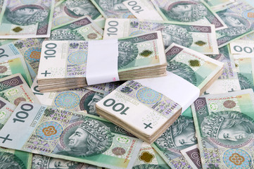 Polish money background. 100 Polish zloty bills pile. Republic of Poland currency