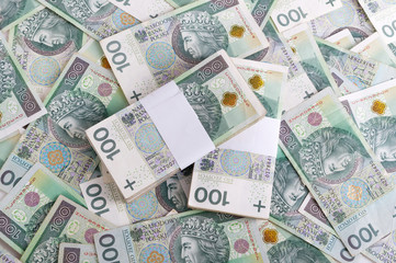 Pile of Polish money 100 zloty (PLN). Polish zloty background.