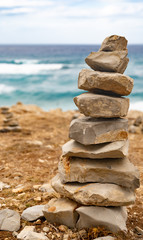 Tower of stones at coast close up