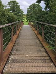 Fototapeta na wymiar Bridge over a river in the english countryside