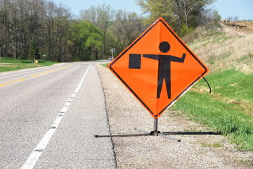 Flagman Ahead sign