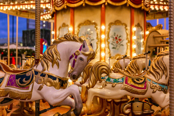 New Year's festive empty carousel with festive illumination. Close-up.