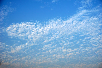 Clouds formation on a blue morning sky and beautiful evening sky.