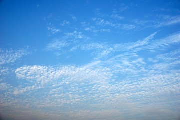 Naklejka na ściany i meble Clouds formation on a blue morning sky and beautiful evening sky.