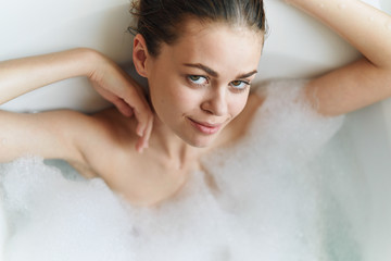Woman in the bathroom relaxing