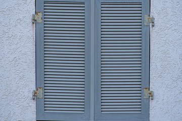 blue shutter closed on a house