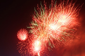 Night shot of beautiful abstract fireworks in festive New Years Eve celebration