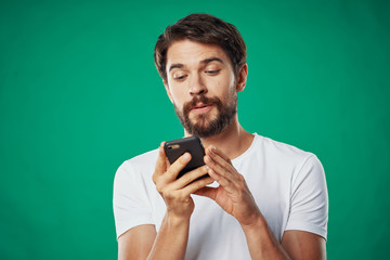 portrait of young man with glass of red wine