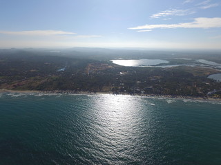 River flows into Back Bay of Indian Ocean near Nilaveli beach in Trincomalee, Sri Lanka. ...