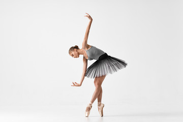 ballet dancer posing isolated on white background