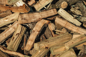 Detail of a pile of cut rustic wood
