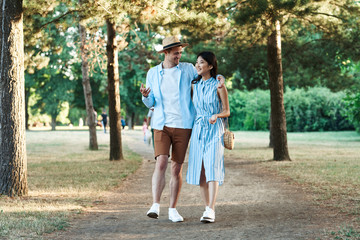 senior couple walking in the park