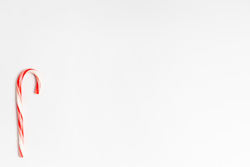 single candy cane on white background