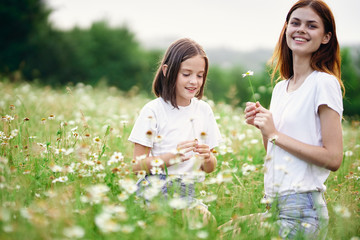 mother and daughter in field