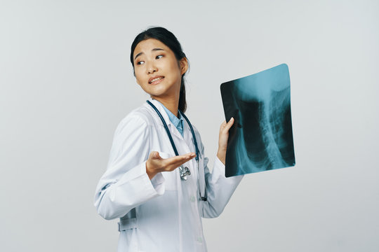 female doctor with xray