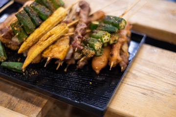 Grilled with Chinese Sichuan Peppers (Ma-la) style, Seller prepare for meals, balls, seafoods and vegetables grill with Sichuan pepper. (Thai Street food.)