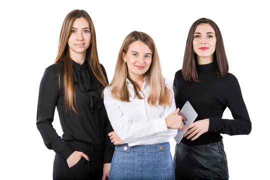 Three Smiling Business Women Standing In A Row Isolated On White Background. Business Group People. Happy Business Team. Businesspeople Isolated On White Background