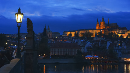 night view of the historic charles bridge and river vltava in prague