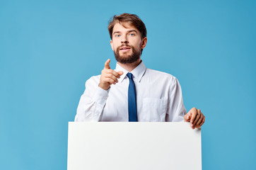 businessman holding blank sign