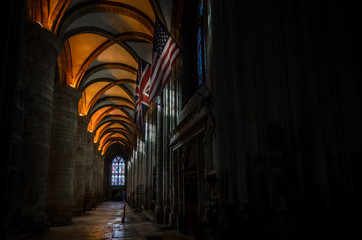 Flags united in Gloucester Cathedral UK showing solidarity and co-operation  
