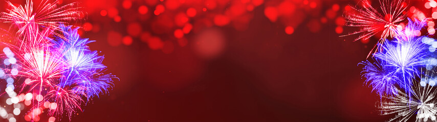 Happy 4th of July background panorama banner long - Firework on red texture with bokeh lights and...