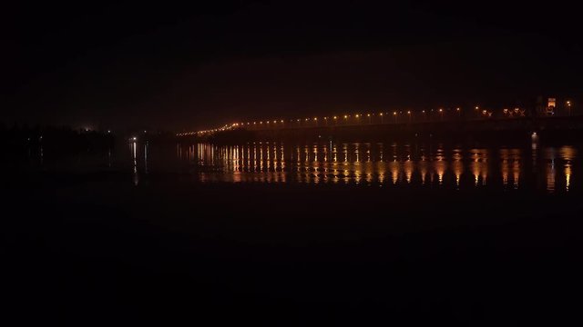 Beautiful night bridge, illuminated by lanterns, Ukraine, Dnipro