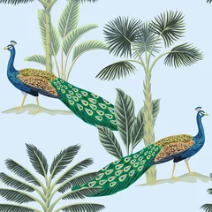 Foto op Plexiglas Pauw Tropische vintage peacock bird, palmboom en plant naadloze bloemmotief blauwe achtergrond. Exotisch junglebehang.
