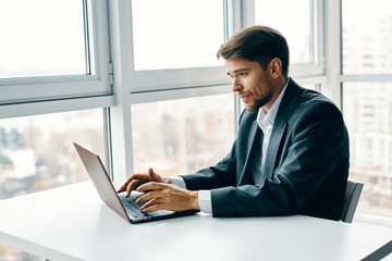 businessman working on laptop in office