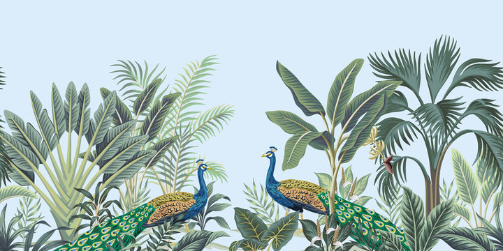  Tropical vintage peacock bird, palm tree and plant floral seamless border blue background. Exotic jungle wallpaper. © good_mood