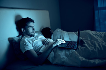 young couple in bed