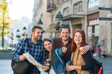 Obraz premium Group of young backpackers in the City