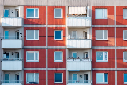 Front view of big building with appartements and shadows