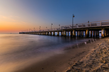 Obraz premium Sunrise over the pier in Gdynia Orlowo.
