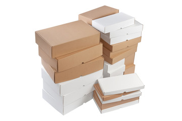 Stacks of brown and white cardboard boxes isolated on white background