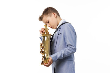 Fototapeta premium boy with saxophone
