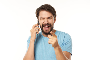 young man talking on the phone isolated on white
