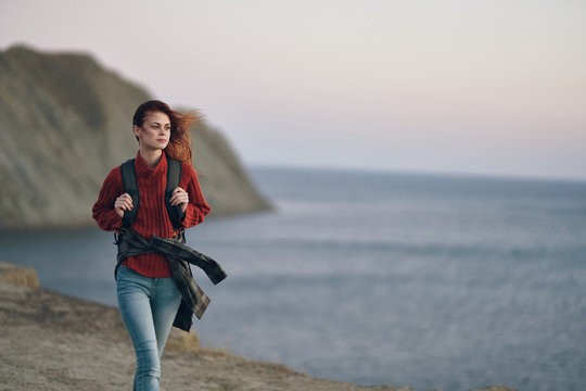 Woman Running On The Beach