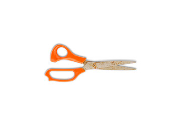 Orange handle scissors rust on the white background isolated with clipping path