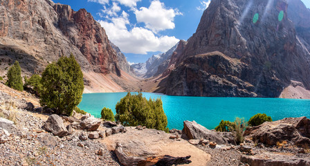 Beautiful view to mountains in Tajikistan. Fan mountains. Greater Allo lake in Fann mountains. Amazing view on mountain lakes on sunny summer day