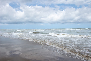 View from the beach to stormy sea. Windy weather  