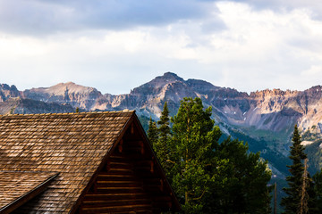Cabin roof and rocky mountains in Telluride