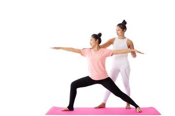 Isolated with clipping path.  Portrait of two beautiful Asian woman practice yoga exercise together.