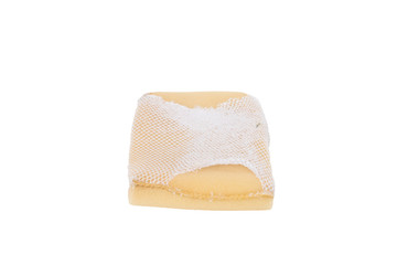 Isolated object with clipping path, dirty old dish washer sponge close up on white background